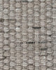 Extreme close up of the textural weave of the Baya Pelorus Grey outdoor rug 