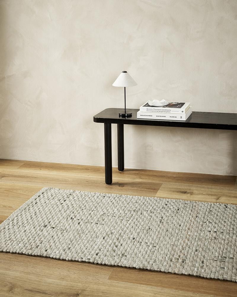 Stylish grey indoor or outdoor rug - Pelorus Grey by Baya - seen in a modern home setting