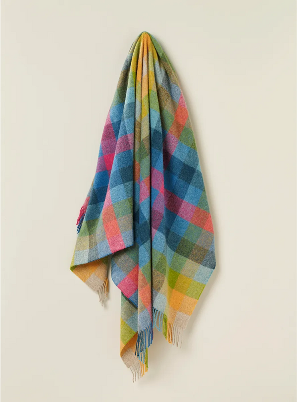 A vibrant, colourful NZ wool throw blanket by Exquisite Wool Traders