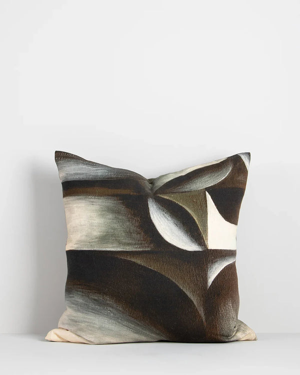 Baya abstract patterned cushion in green, brown, black and cream tones