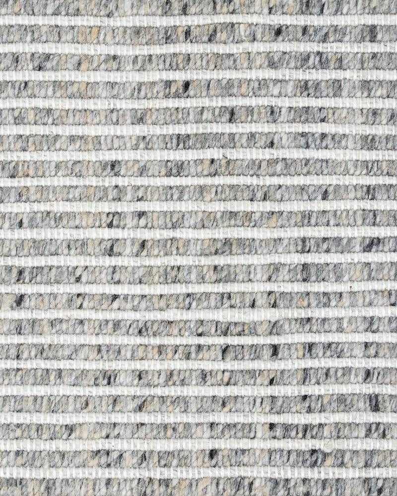 Extreme close up of the grey and white weave of the Rhodes Slate Grey runner rug by Baya nz