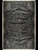 Full view of the black and white Elio 100% wool rug by Tribe Home, shown from above