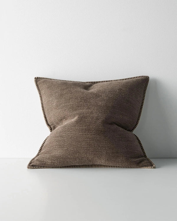 Brown textural cushion with an elegant stitching feature, by Weave Home