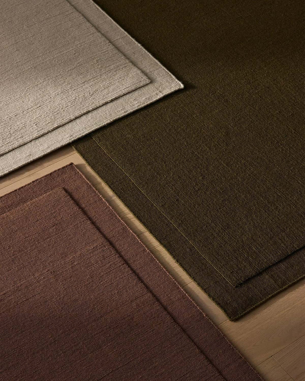Three beautiful NZ wool rugs called 'Cassio' in beige, burgundy and chocolate brown.