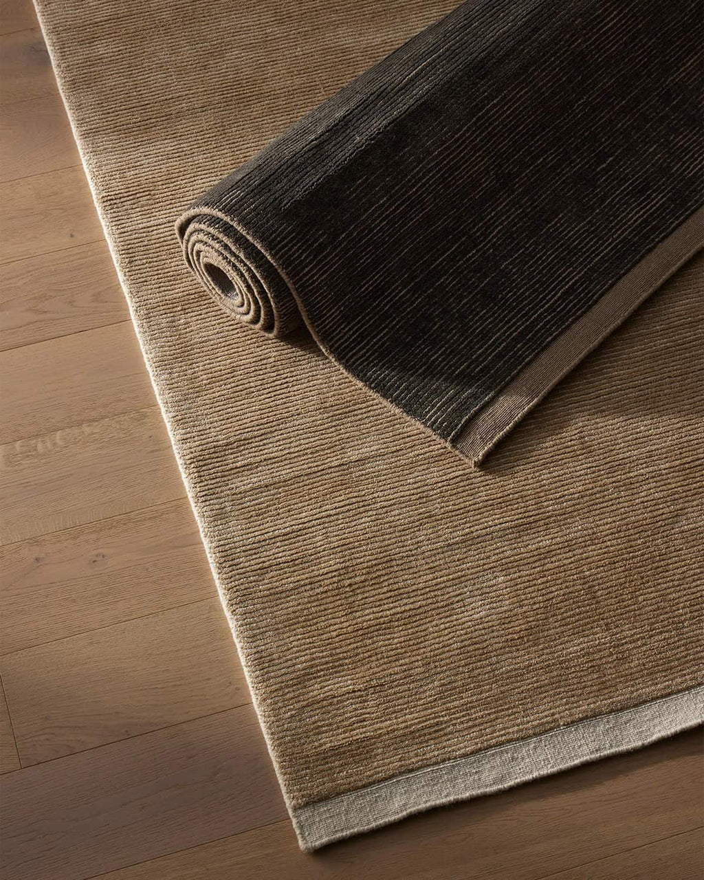 Weave Home NZ wool beige rug with navy rug on top