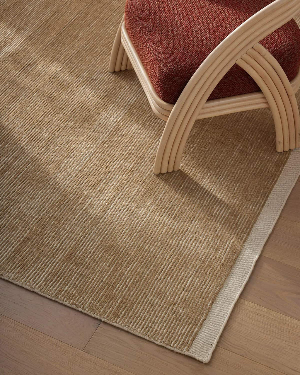 Weave Home NZ wool Beige rug on a wooden floor 