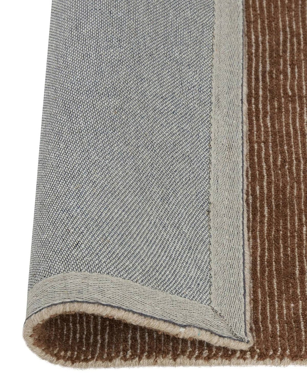 Weave Home NZ wool close-up corner of amber rug 