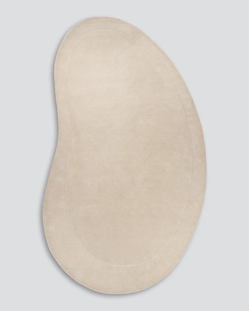 Baya 'Form' wool rug in cream, seen from above in full