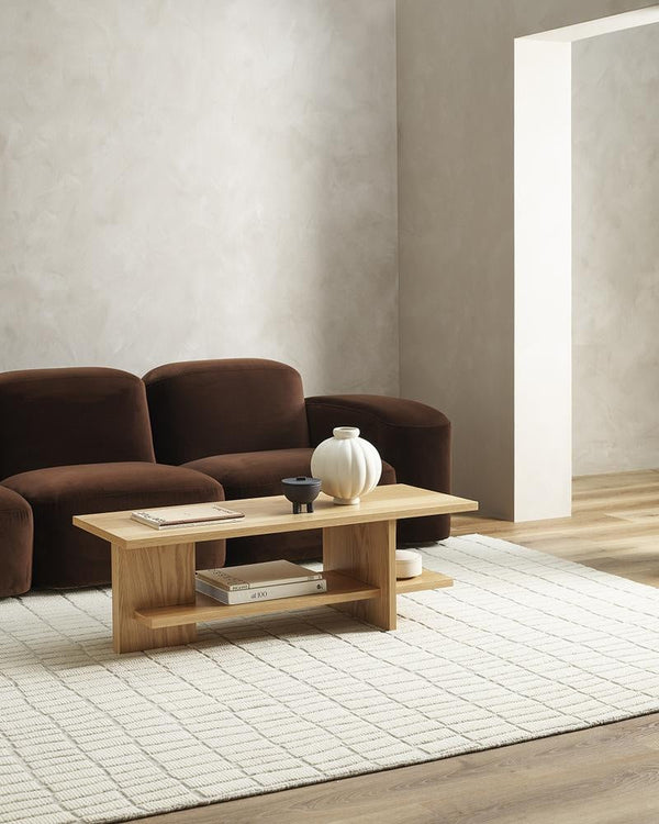 Exquisite cream textural floor rug in pure wool, seen in a modern living room