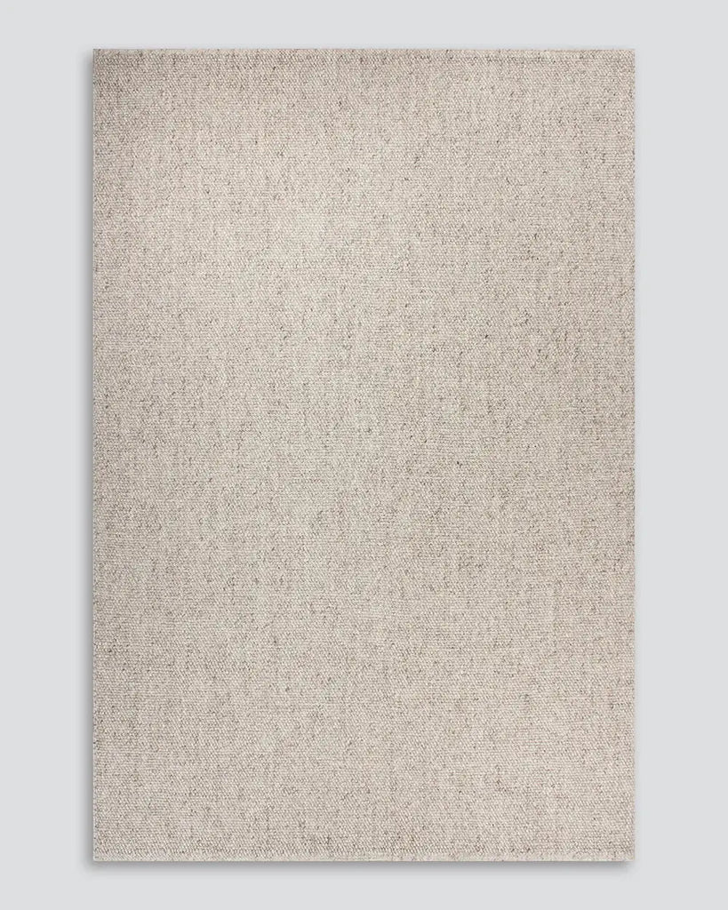 The Baya woven textural floor rug 'Omaha' in colour 'Pebble' seenfrom above