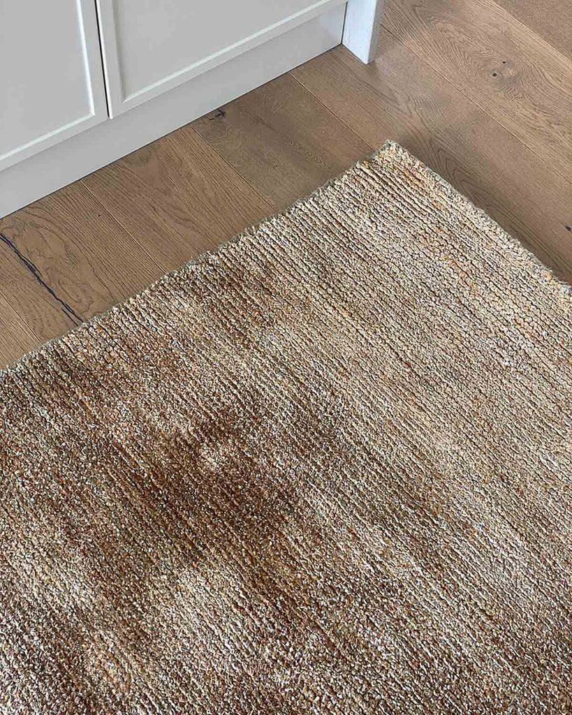 Baya NZ Anchorage floor runner in Sand Dune in a close up, showing the warm brown tones and jute/wool blend.