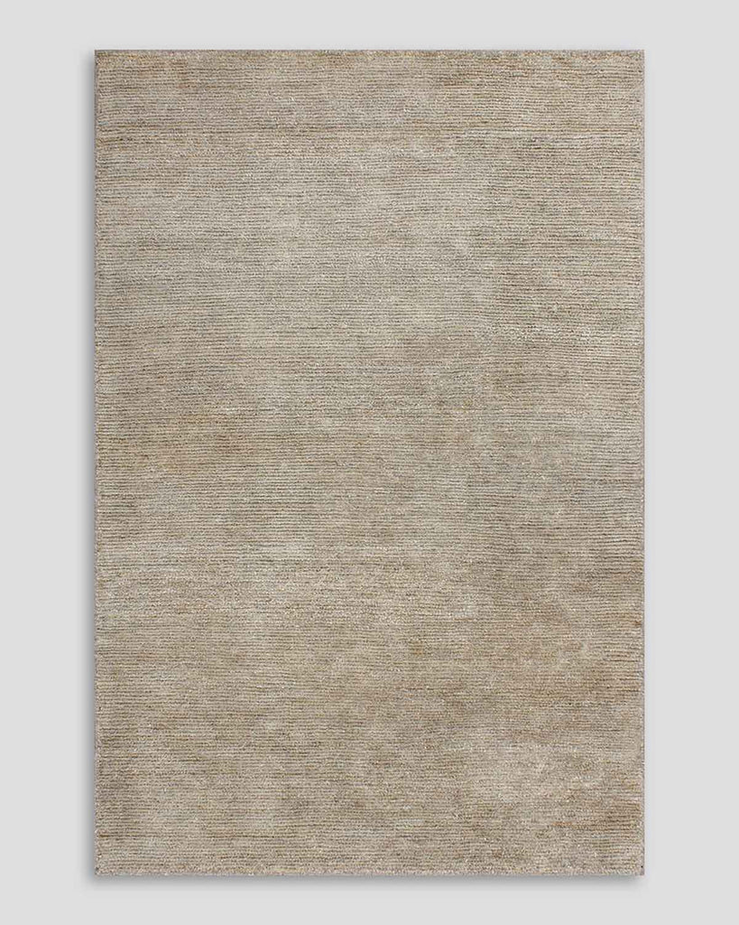 Full image of Baya NZ Anchorage rug in shade Stone, a soft warm beige. The full image highlights the texture differences between wool and jute within the rug. 