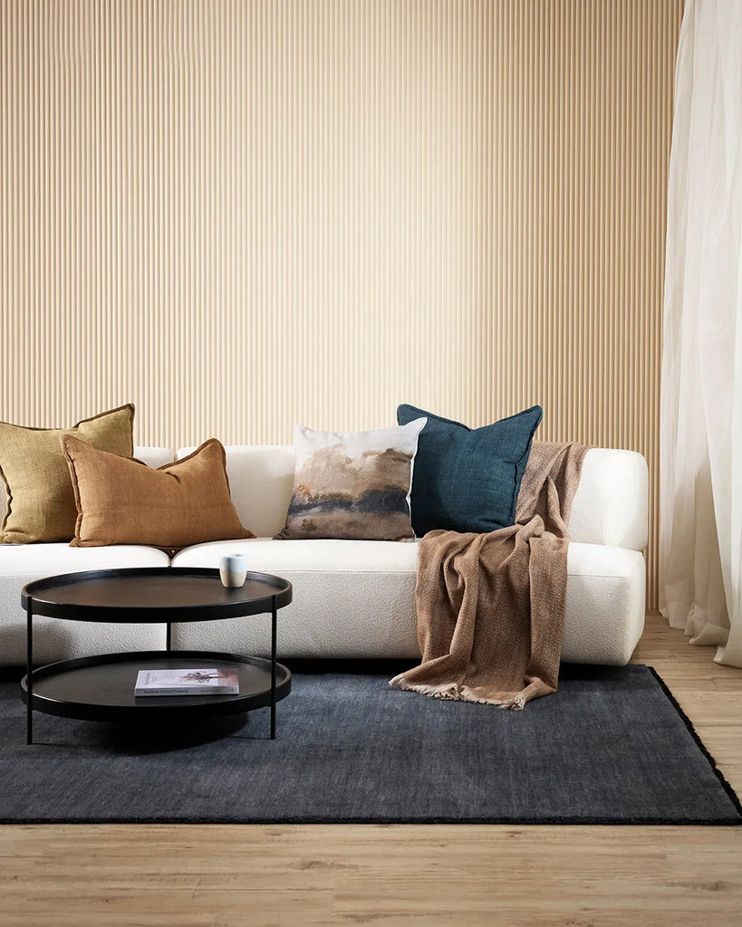 Baya linen cushions decorating a couch in a contemporary nz home