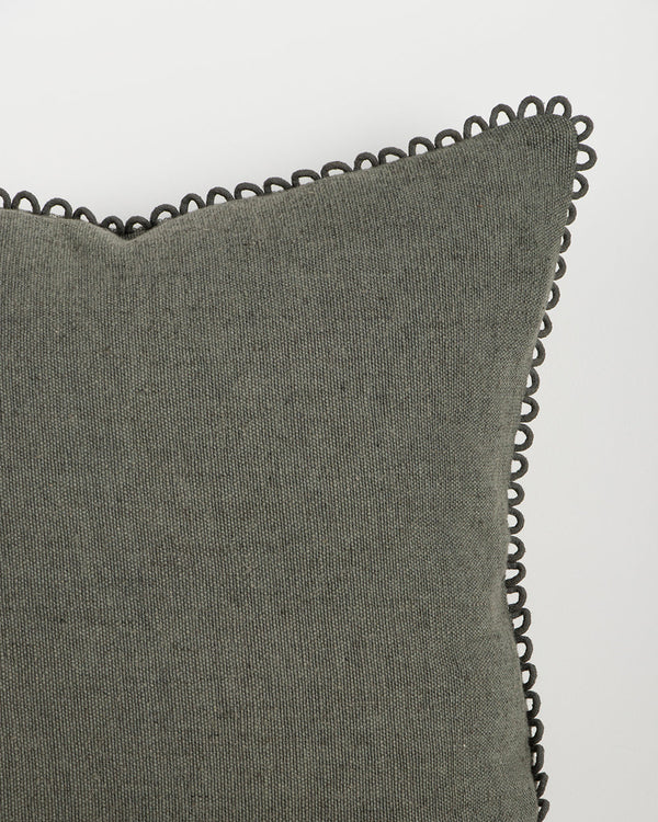 Baya Alden linen cotton blend cushion in Sage, close view of the loop-edge trim