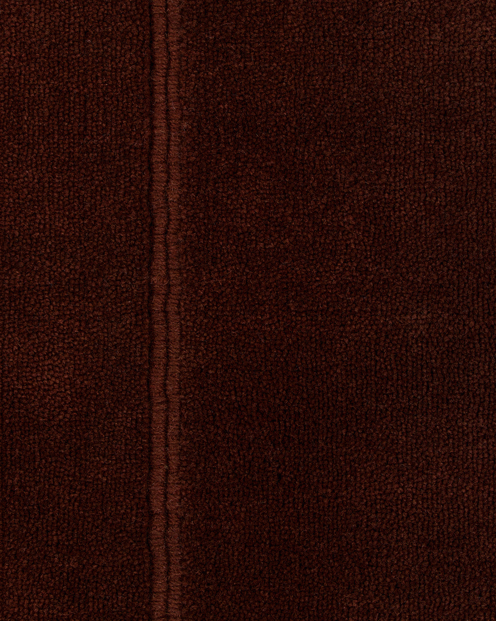 Baya Bastion NZ wool floor rug in Claret, close view of the pile and raised lengthwise ridge.