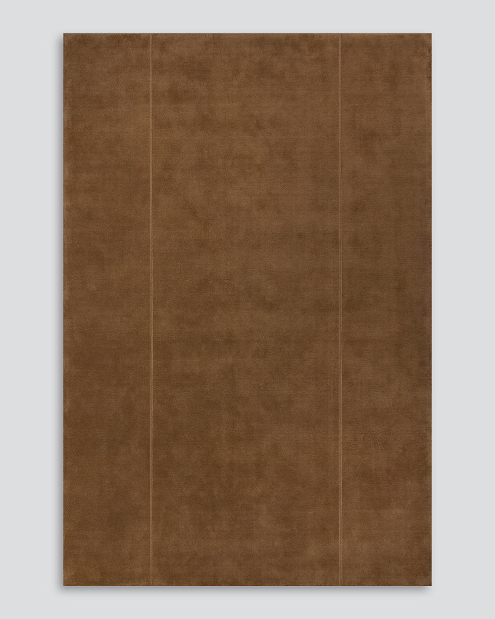 Baya Bastion NZ wool floor rug in Hazelnut, full flat view on a plain background, showing the two fine lengthwise lines.