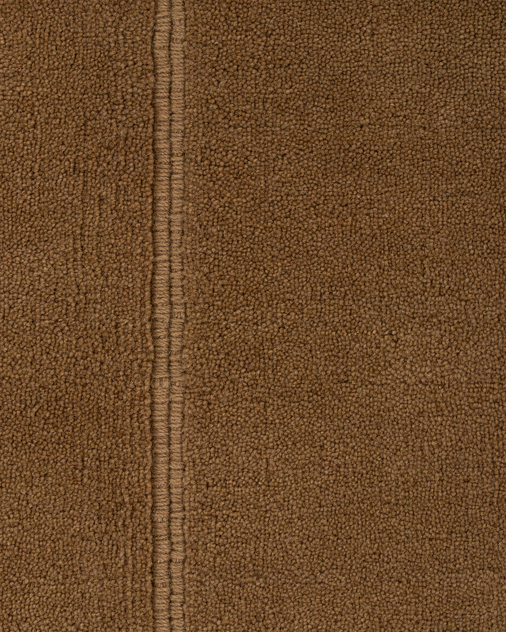 Baya Bastion NZ wool floor rug in Hazelnut, close view of the pile and raised lengthwise ridge.