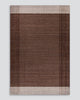 Baya Bedrock Indoor and Outdoor Floor Rug in Claret, full flat-lay product shot on a plain grey background showing the deep chocolate-brown field with pale striped borders top and bottom.