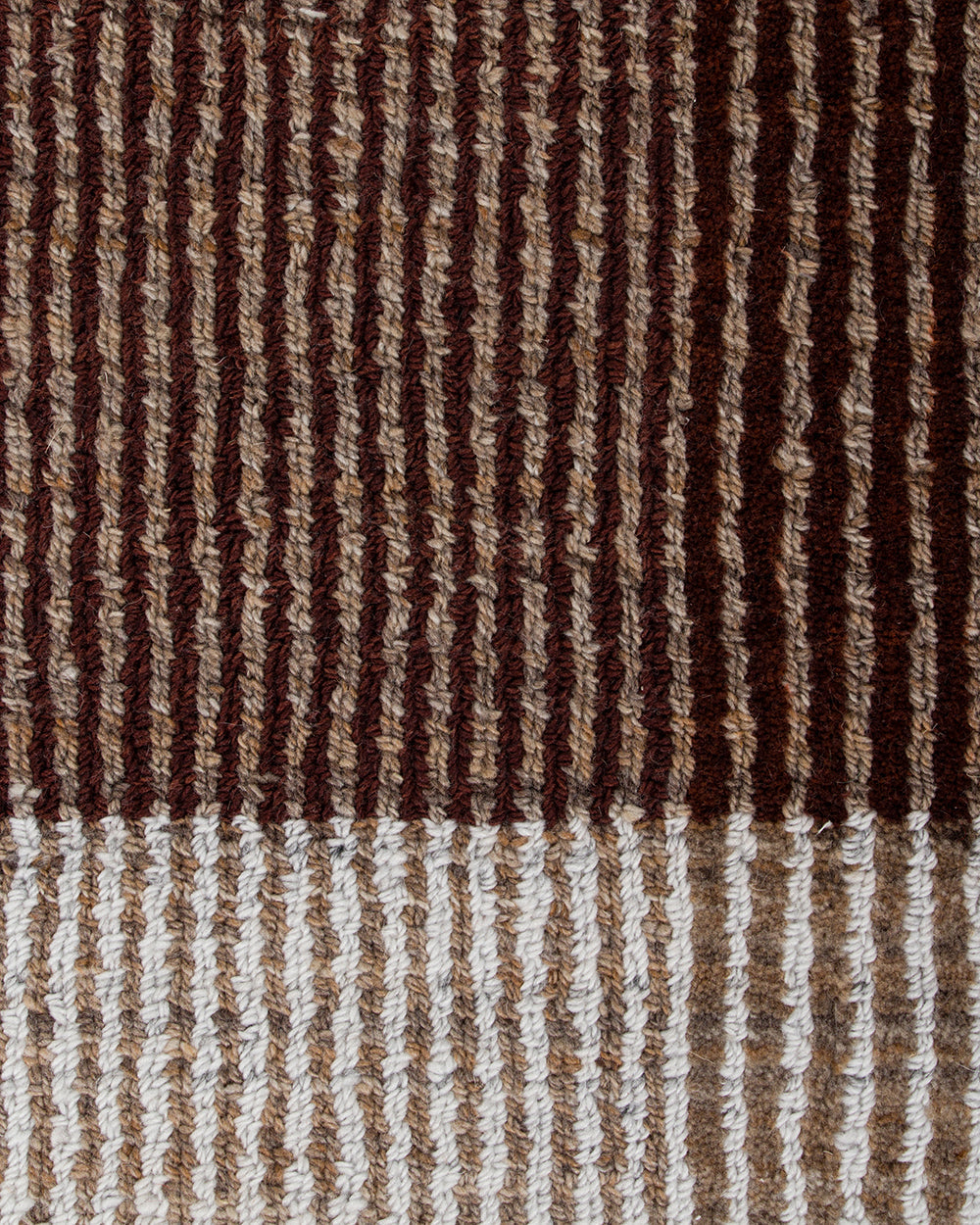 Baya Bedrock Indoor and Outdoor Floor Rug in Claret, close-up texture detail of the flatweave showing dark chocolate-brown ribbed stripes meeting the paler oatmeal striped border.