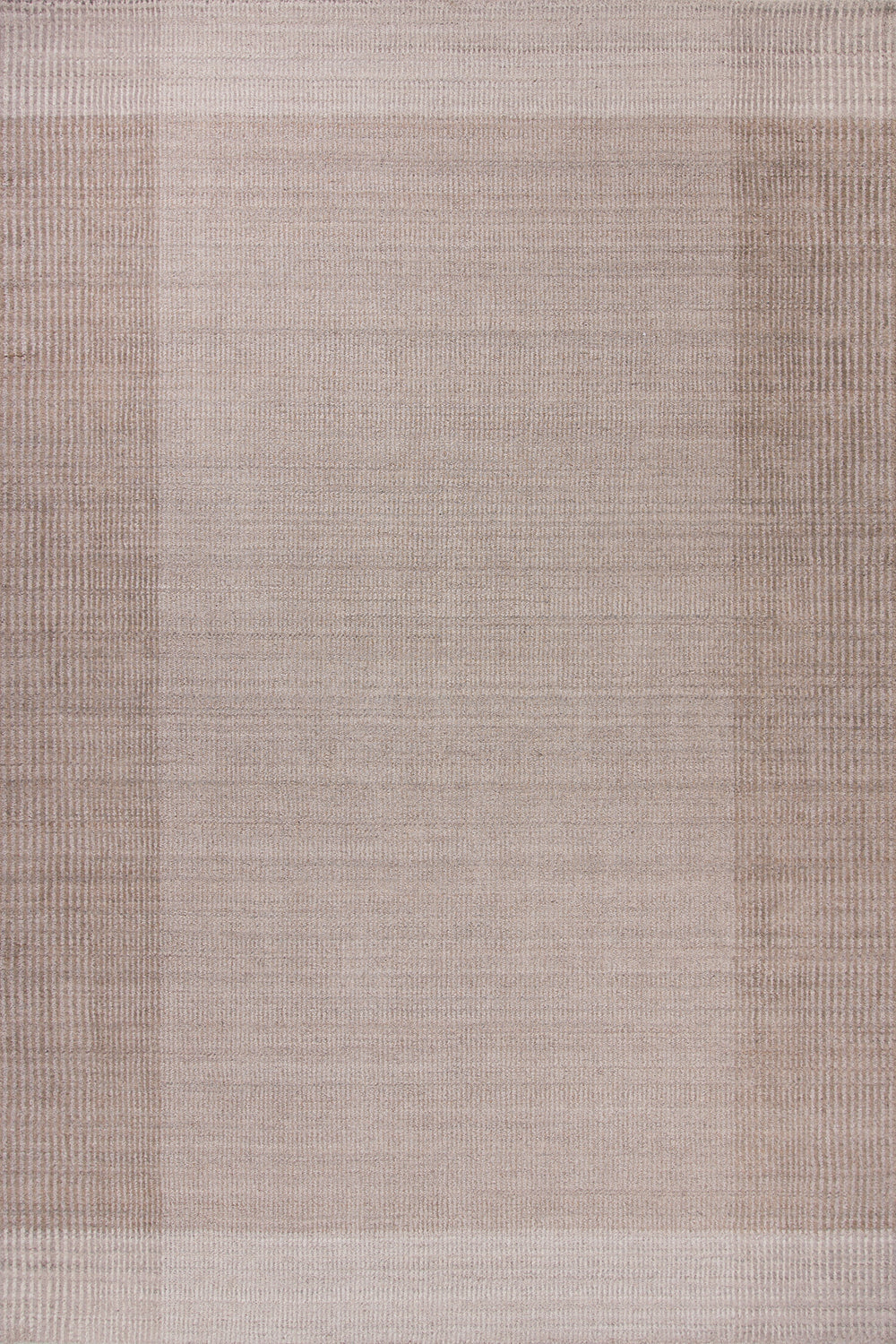 Baya Bedrock Indoor and Outdoor Floor Rug in Sand, full flat-lay view of the whole rug showing the pale sand field with darker taupe side borders and a cream stripe framing the top and bottom.