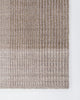 Baya Bedrock Indoor and Outdoor Floor Rug in Sand, flat-lay corner detail on a white background showing the taupe striped field meeting the paler grey-beige striped border.