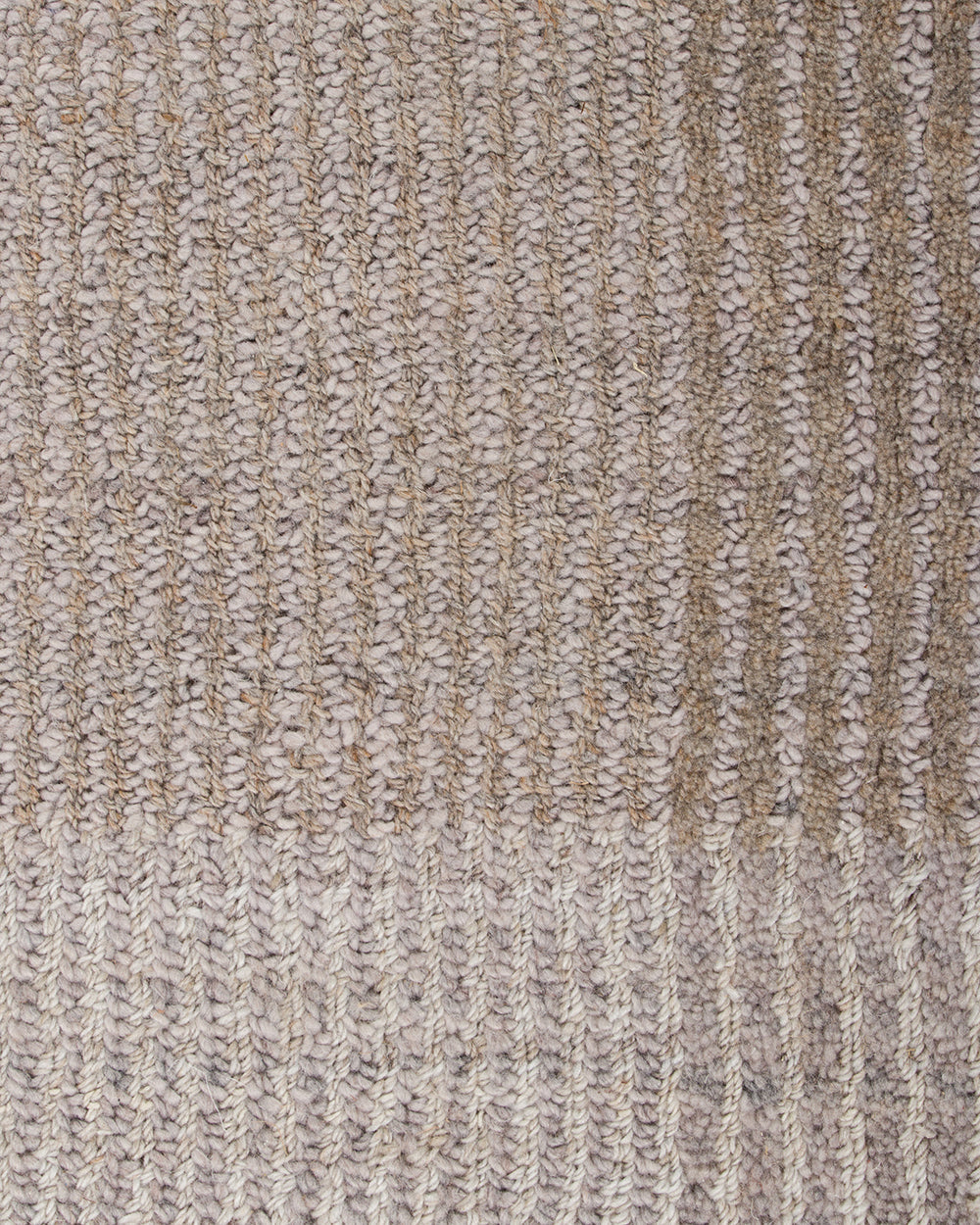 Baya Bedrock Indoor and Outdoor Floor Rug in Sand, close-up texture detail of the flatweave showing the taupe ribbed stripes meeting the paler cream striped border.