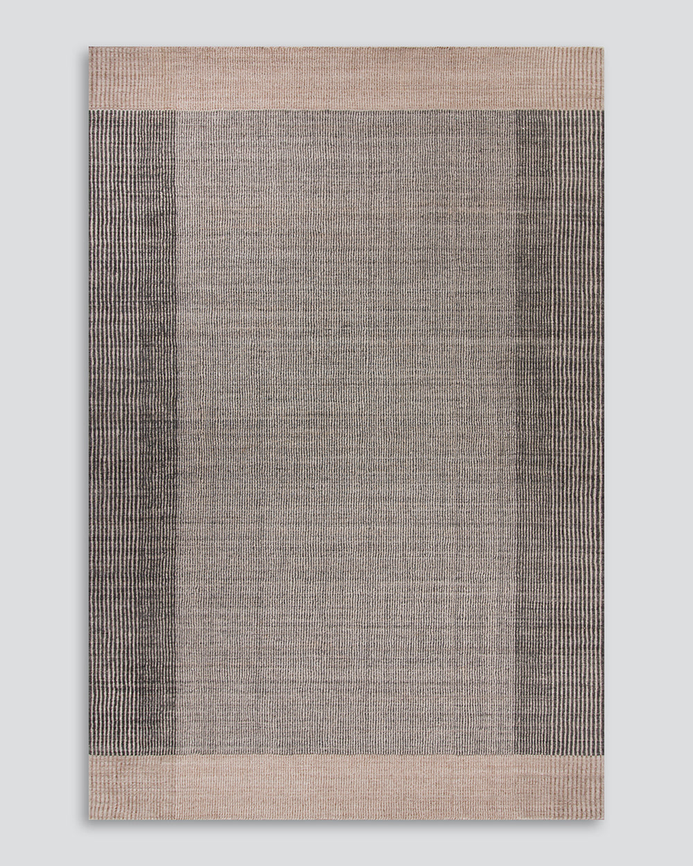 Baya Bedrock Indoor and Outdoor Floor Rug in Zinc, full flat-lay product shot on a plain grey background showing the charcoal-grey field with darker charcoal side stripes and a pale sand border top and bottom.