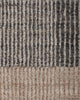 Baya Bedrock Indoor and Outdoor Floor Rug in Zinc, close-up texture detail of the flatweave showing the charcoal-grey ribbed stripes meeting the paler sand striped border.