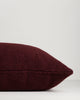 Close-up of the side and zip on the Baya Clipper recycled PET outdoor lumbar cushion in Claret