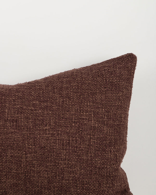 Baya Cyprian cotton blend lumbar cushion in Espresso on a plain background.