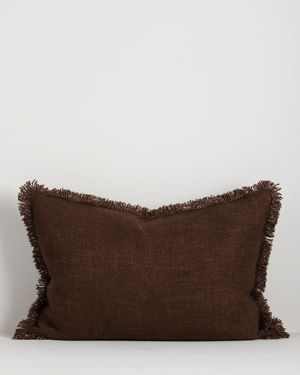 Baya Dover linen blend lumbar cushion in Chocolate, 40 x 60cm, front view on a plain background showing the fringed edge and textured weave