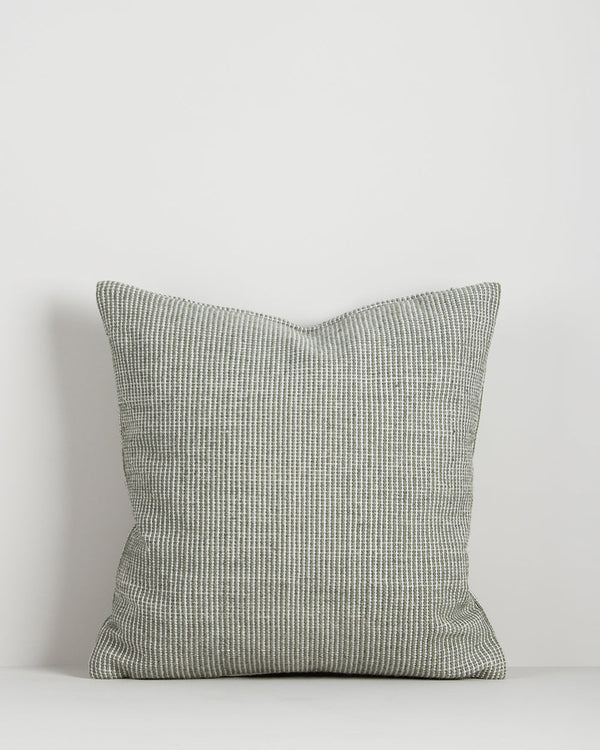 Baya Dune outdoor cushion in Eucalyptus, front view on a plain background, showing the handwoven bi-colour texture