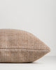 Close-up side profile of the Baya Dune outdoor cushion in Tobacco, showing the corner point and piped edge