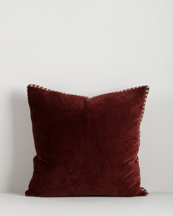 Baya Edward cotton velvet box cushion in Oxblood on a plain background