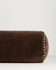 Baya Elliot cotton velvet bolster cushion in Chocolate, close view of the velvet texture and striped piped end