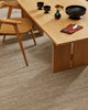 Baya Fairmont NZ Wool Floor Rug in Ash, close view under a dining table set with dark ceramics and a napkin