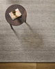 Baya Fairmont NZ Wool Floor Rug in Ash, overhead view beside a round side table with a book and vase