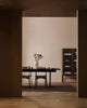 Baya Fairmont NZ Wool Floor Rug in Bracken, alternate wide view of the dining room with a glass-front cabinet