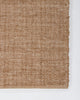 Baya Ormond outdoor rug in Biscotti, close view of a corner showing the flat-woven texture and edge.