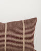 Close-up of the corner and weave texture on the Baya Shore outdoor lumbar cushion in Claret