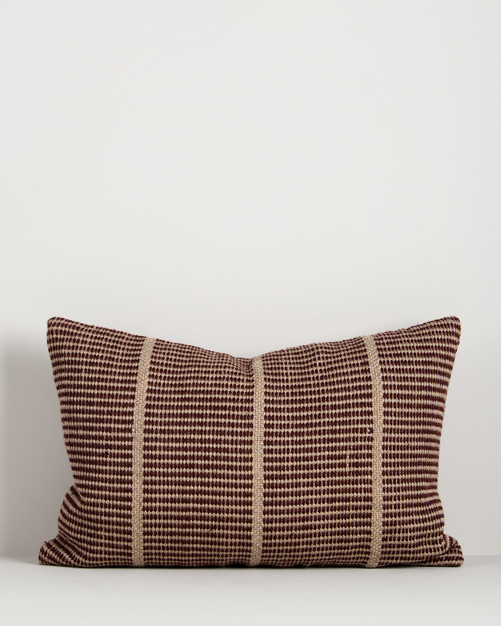 Baya Shore recycled PET outdoor lumbar cushion in Claret, full front view