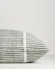 Close-up of the end seam and weave on the Baya Shore outdoor lumbar cushion in Eucalyptus