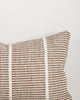 Close-up of the corner and weave texture on the Baya Shore outdoor lumbar cushion in Tobacco