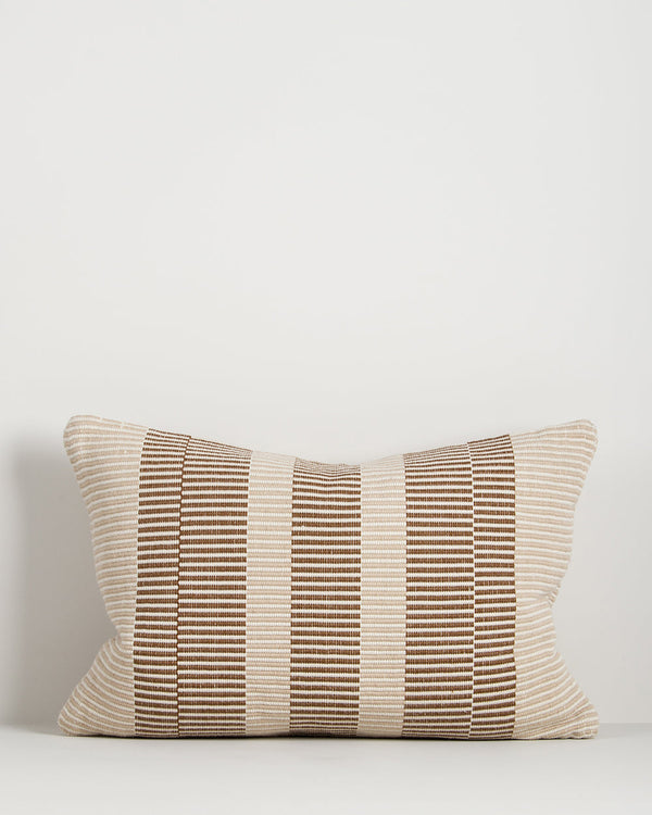 Baya Solar Outdoor Lumbar Cushion in Chocolate on a plain background, showing the brown and cream stripe weave.
