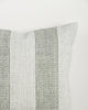 Close-up of the Baya Tide Outdoor Cushion in Eucalyptus, showing the woven linework stripe and piped edge.