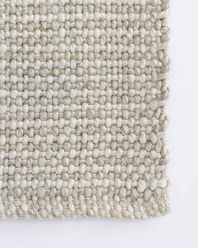 A close up, top-down view of the corner of the Kansa rug by Baya NZ. 