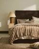 A stylsih nz bedroom setting that includes home decor by Weave Home nz