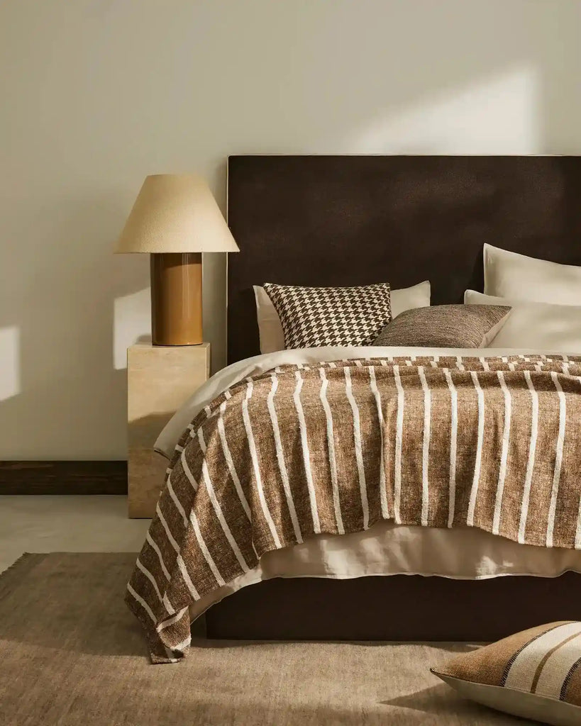 A stylsih nz bedroom setting that includes home decor by Weave Home nz