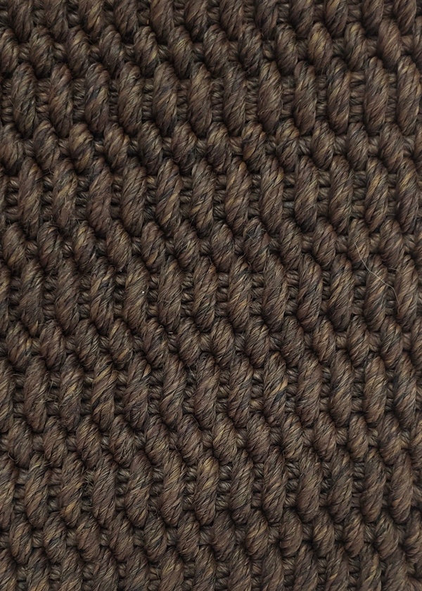 Close-up of the By Carmont Bisque rug's PET weave texture in Coffee