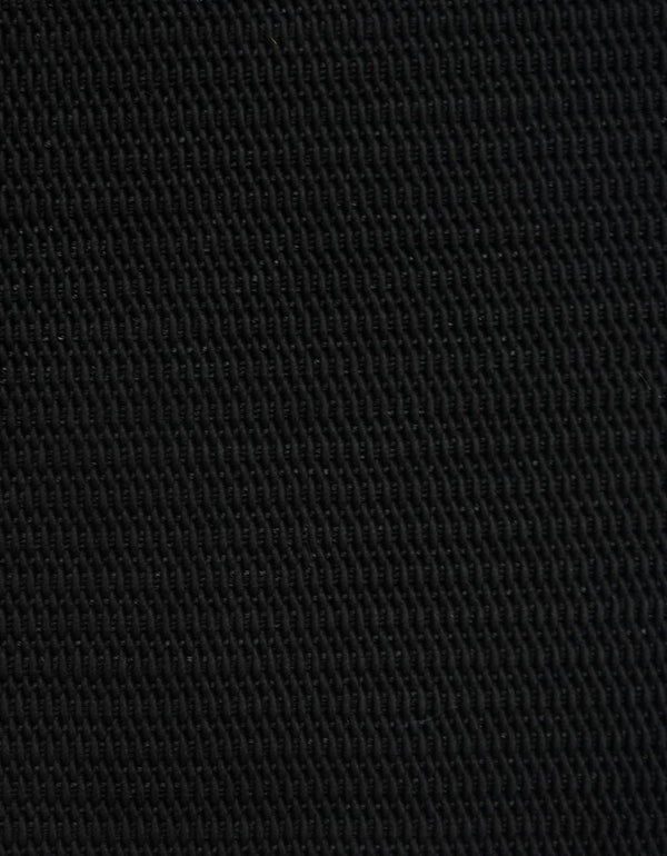 By Carmont Bisque floor rug in Sable, close-up of the dense textured weave
